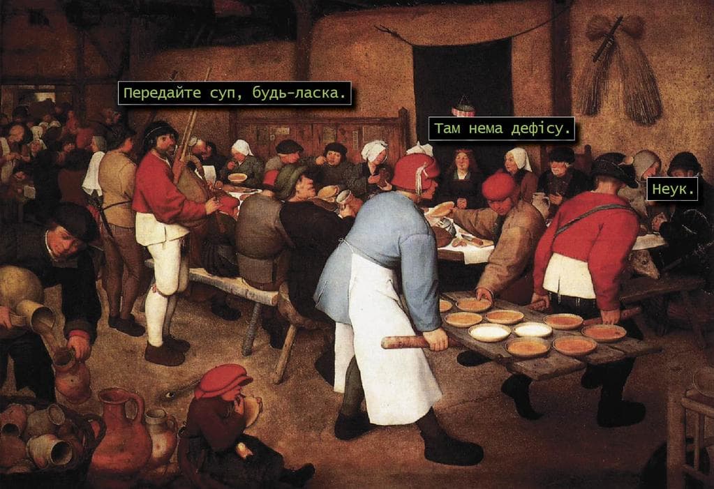 Група людей, які сидять перед натовпом